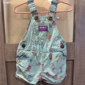 Vintage 80s Oshkosh overalls vestbak with thumbprint characters. Made in USA 18m